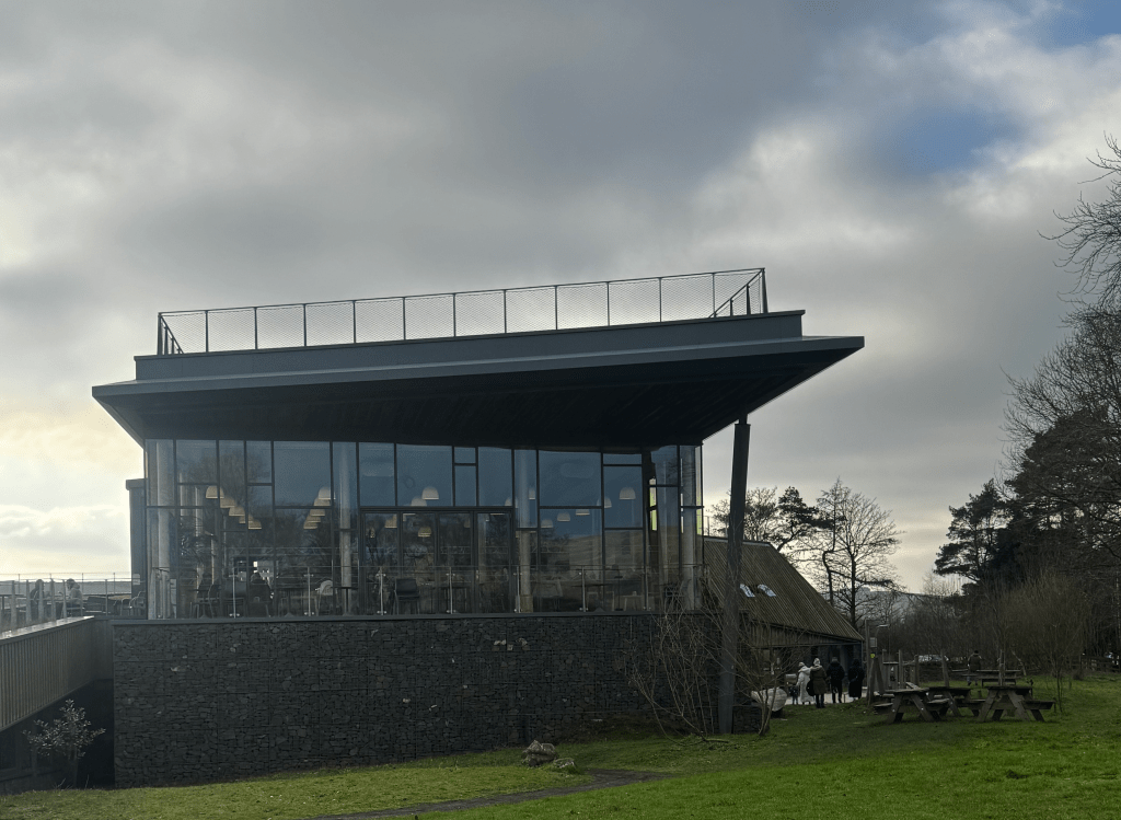 The Sill, a modern glass building.