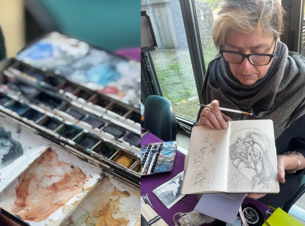 A collage of two images. On the left there is a paint pallet which has been well used. On the right Jackie is holding a brush and showing her notebook, which has a sketch of a girl being hugged by a bear.